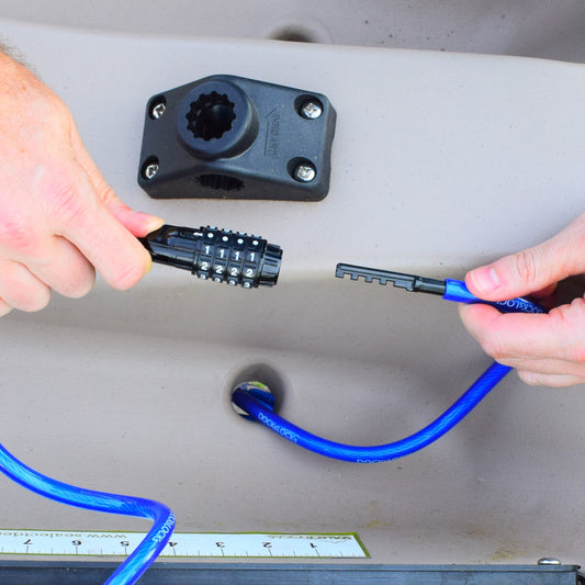 DocksLocks straight combo cable lock securing a kayak overnight at camp