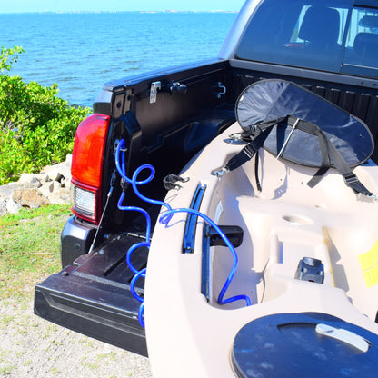 DocksLocks kayak lock securing a kayak in a truck bed near the water